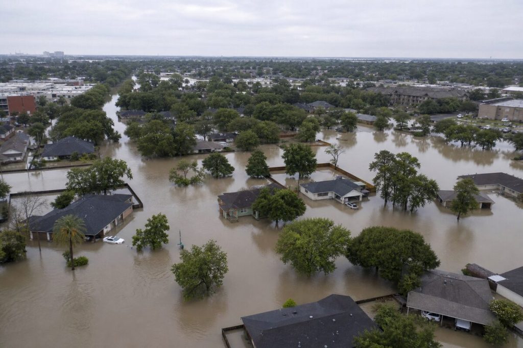 Aerial view of a flooded Houston suburban neighborhood after a major storm