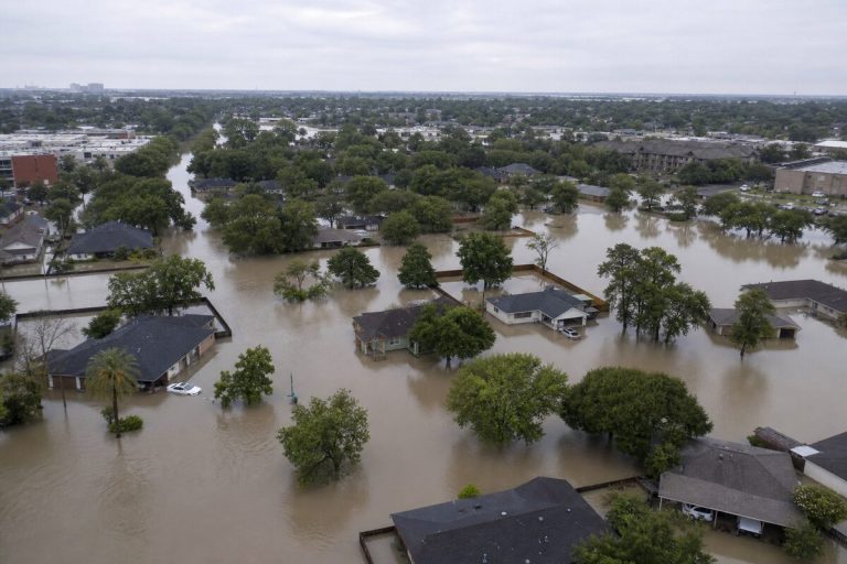 Aerial view of a flooded Houston suburban neighborhood after a major storm